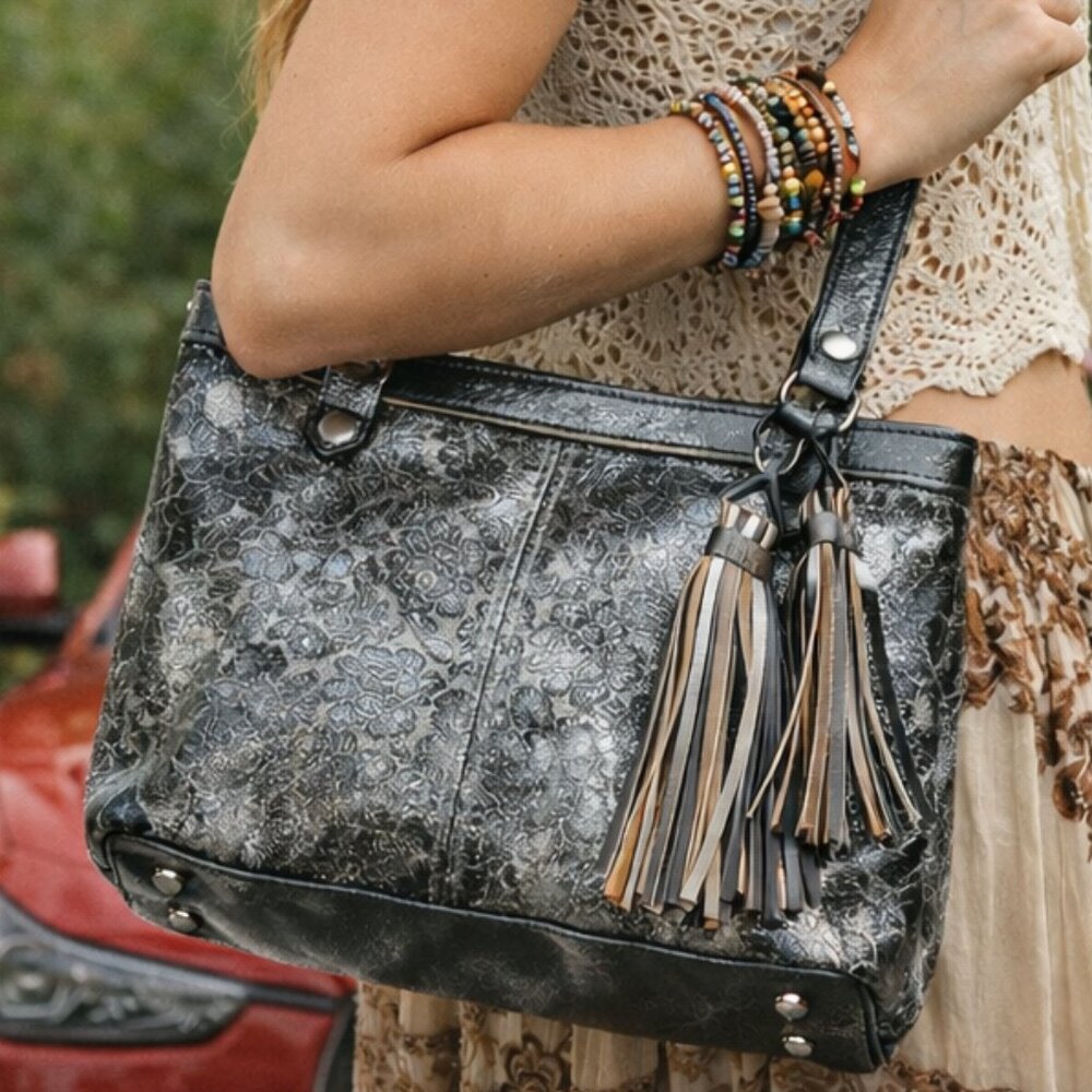 Patricia Nash Black Embossed Leather Shoulder Bag with Tan and Cream Tassels